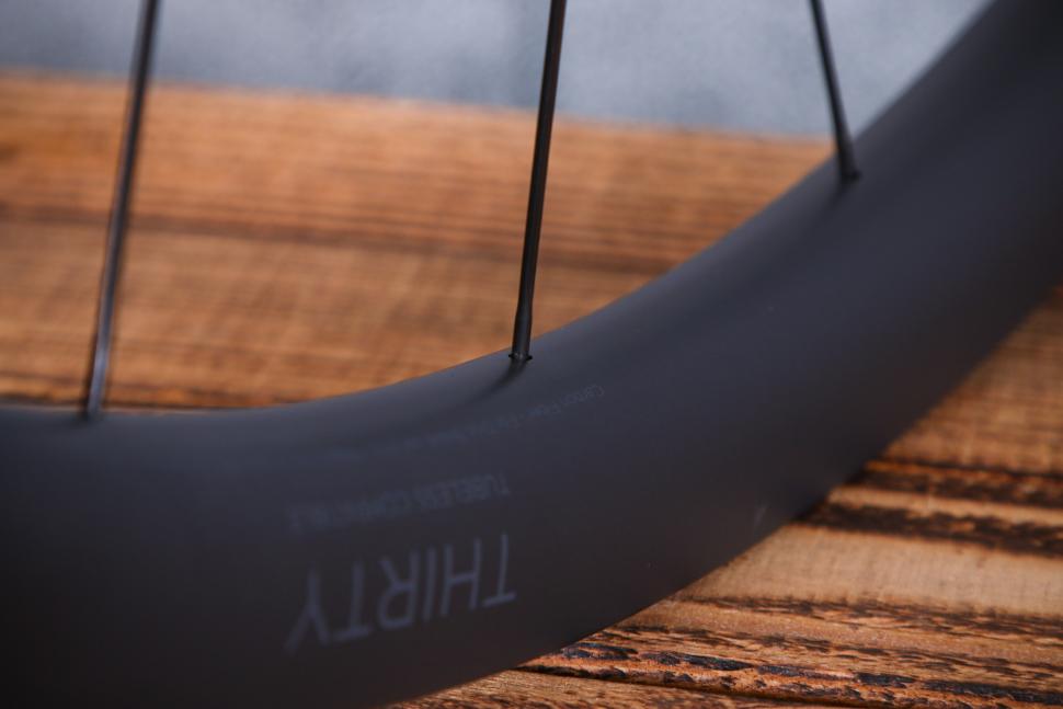 2023 Black Inc Thirty wheelset - spoke nipple.jpg