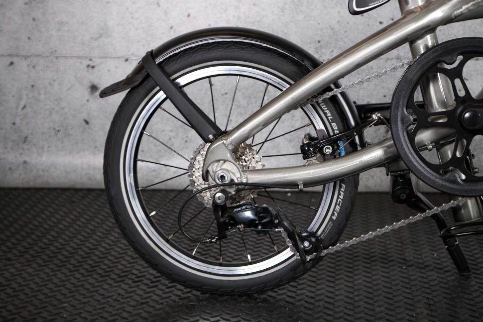 2023 BTwin Ultra compact 1 second light folding bike - rear hweel.jpg