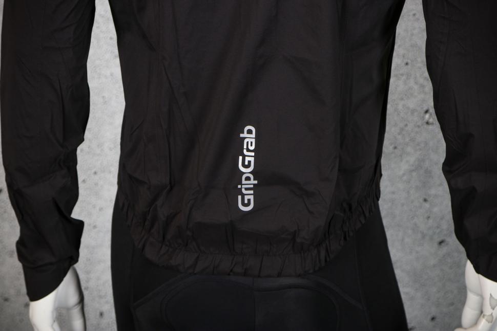 2023 GripGrab Lightweight Waterproof Jacket - back logo.jpg