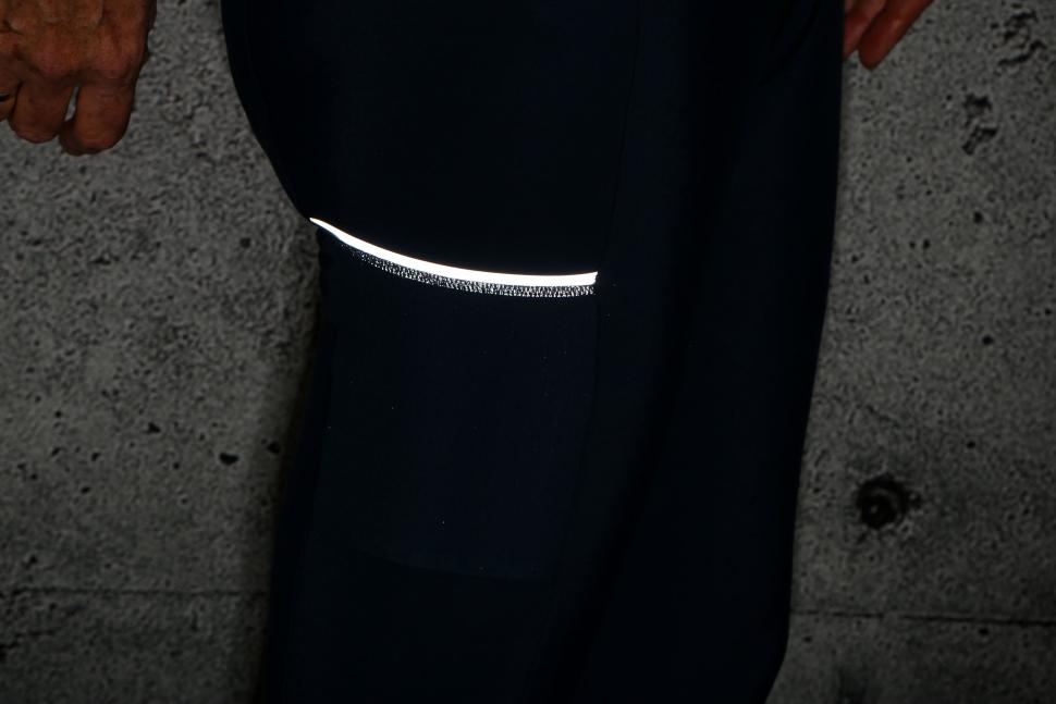 2023 Iris Dark Indigo Escape Bib Tights - pocket reflective.jpg
