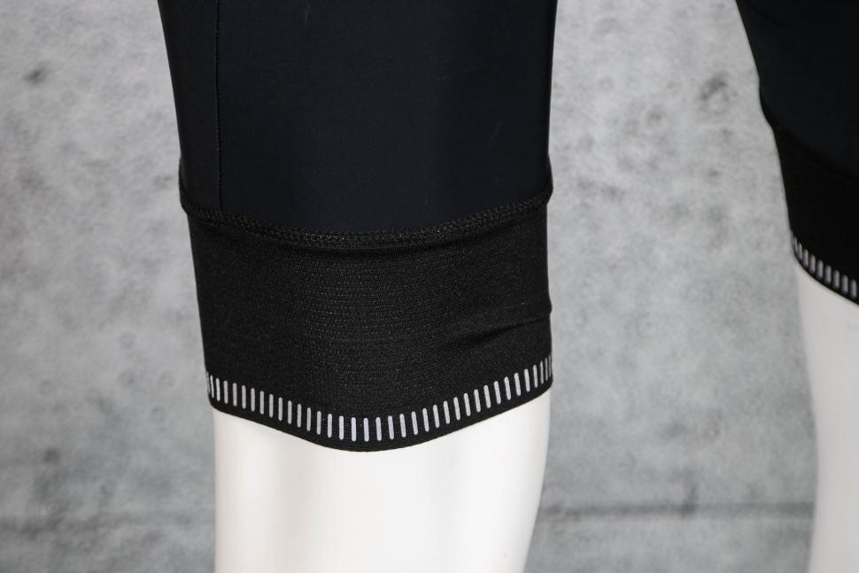 2023 Lusso Perform Carbon Bib Shorts - cuff back.jpg