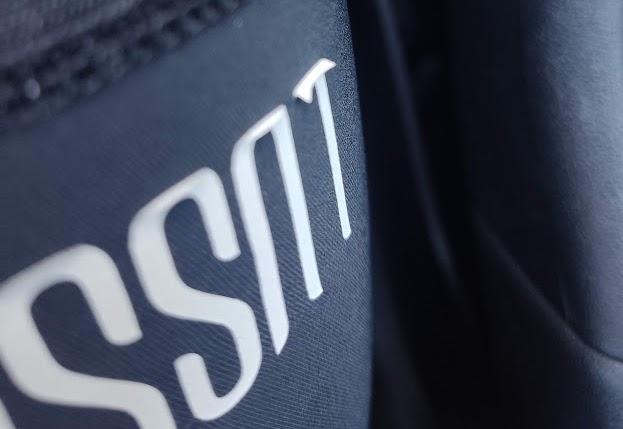 2023 Lusso Perform Carbon Bib Shorts slight peeling of logo.jpg