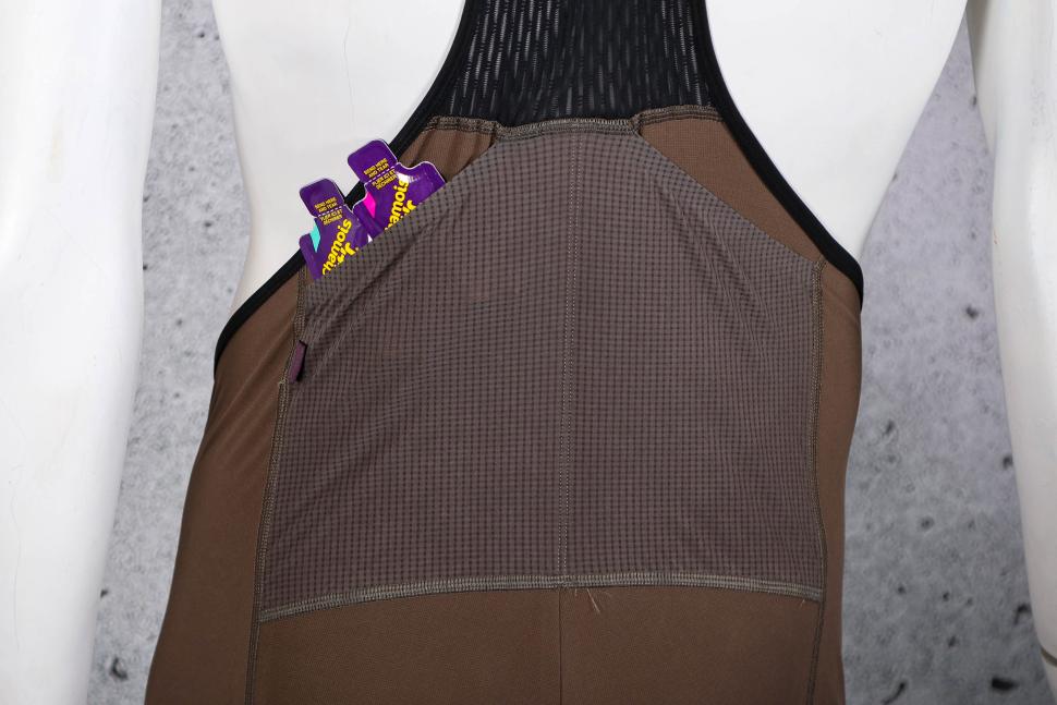 2023 Pas Normal Studios Men's Escapism Bibs - back pocket.jpg