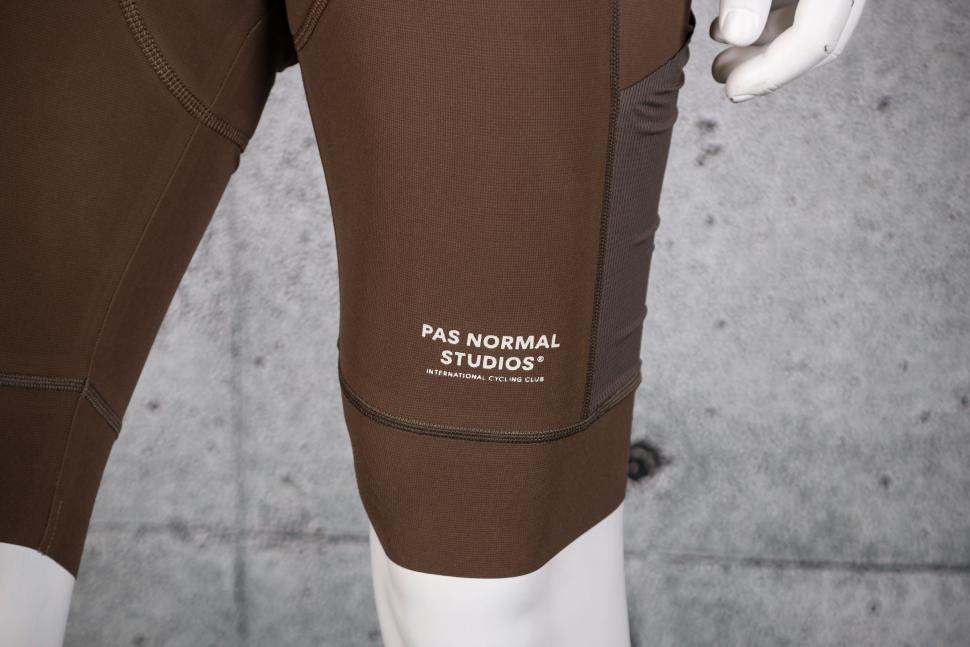 2023 Pas Normal Studios Men's Escapism Bibs - cuff logo.jpg