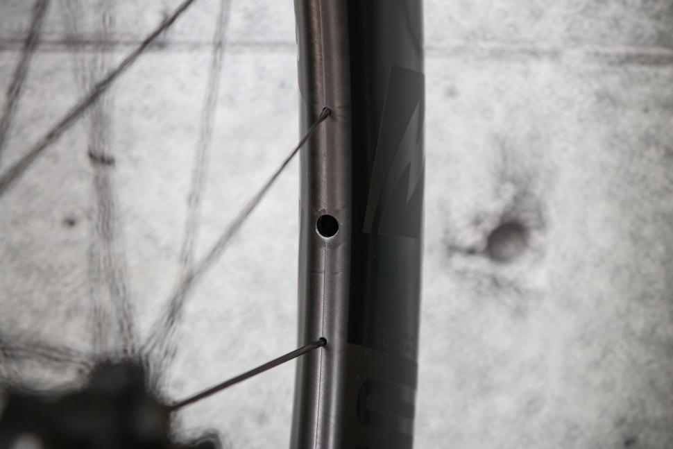 2023 Reynolds Blacklabel 60 Expert DB wheelset - valve hole.jpg