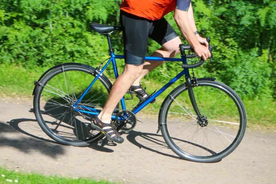 Spa Cycles Audax Mono bike cycled by a man in shorts
