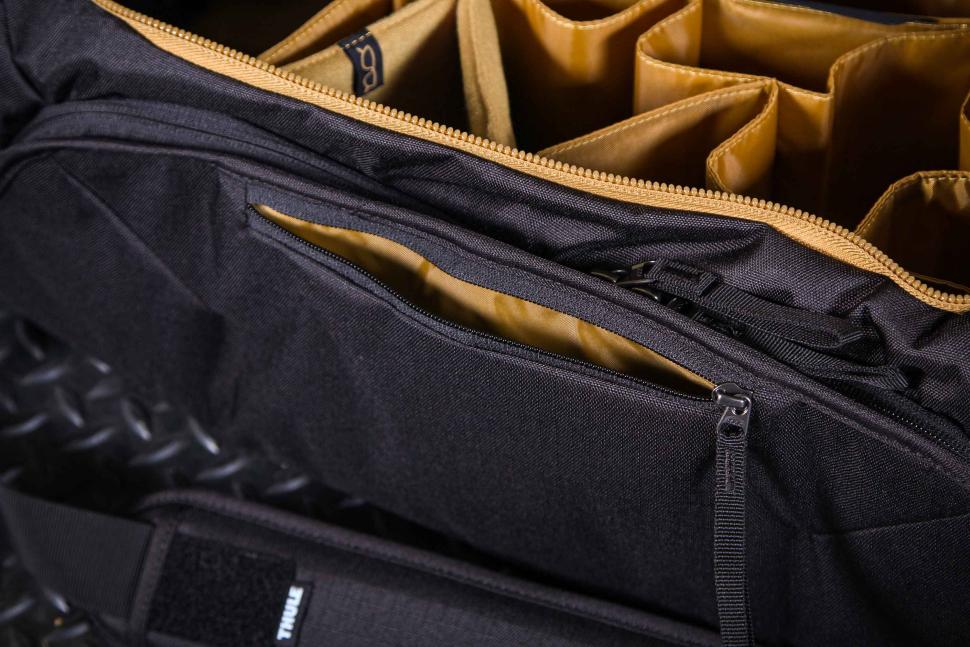 2023 Thule RoundTrip bike duffel black - front zip pocket.jpg