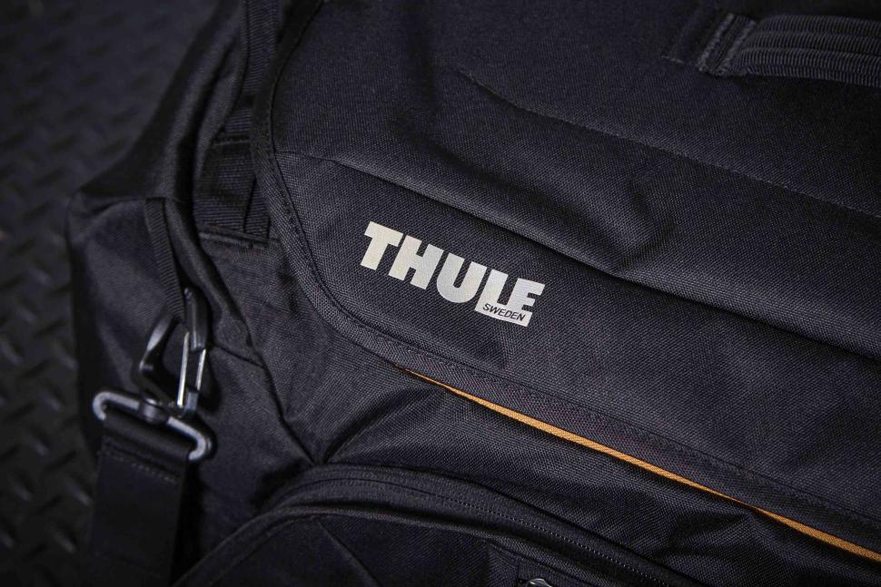 2023 Thule RoundTrip bike duffel black - logo detail.jpg