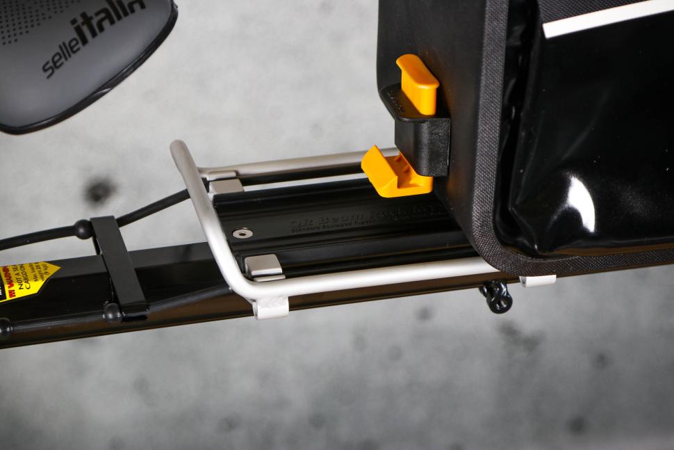 2023 Topeak DryBag MTX Trunk Bag - sliding on to rack.jpg