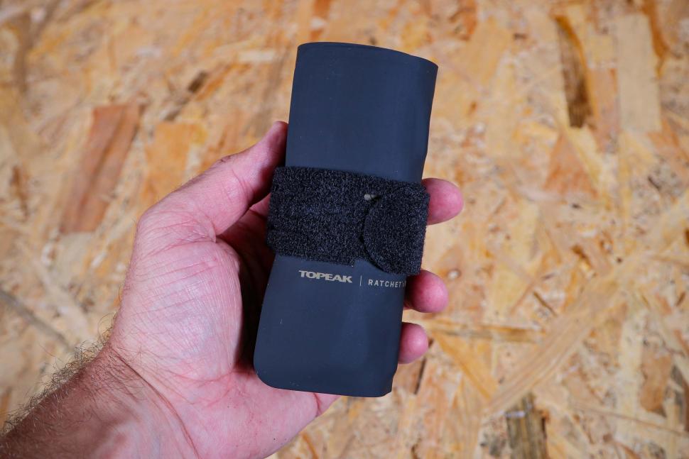 2023 Topeak Ratchet N Roll Elite - rolled in hand.jpg