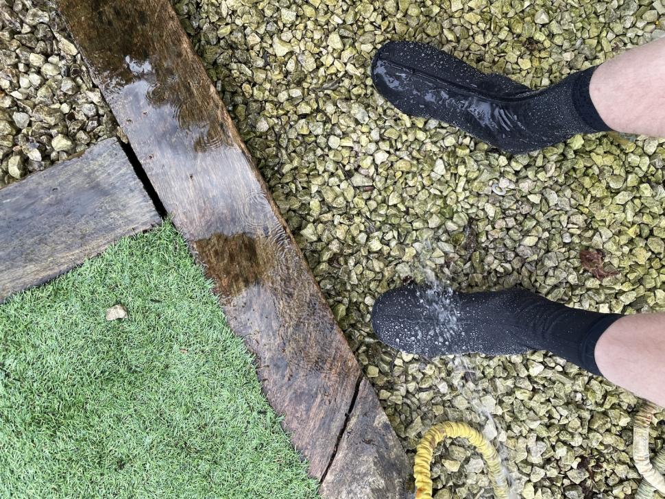 2023 Universal Colours Mono Overshoes taking a shower.jpg