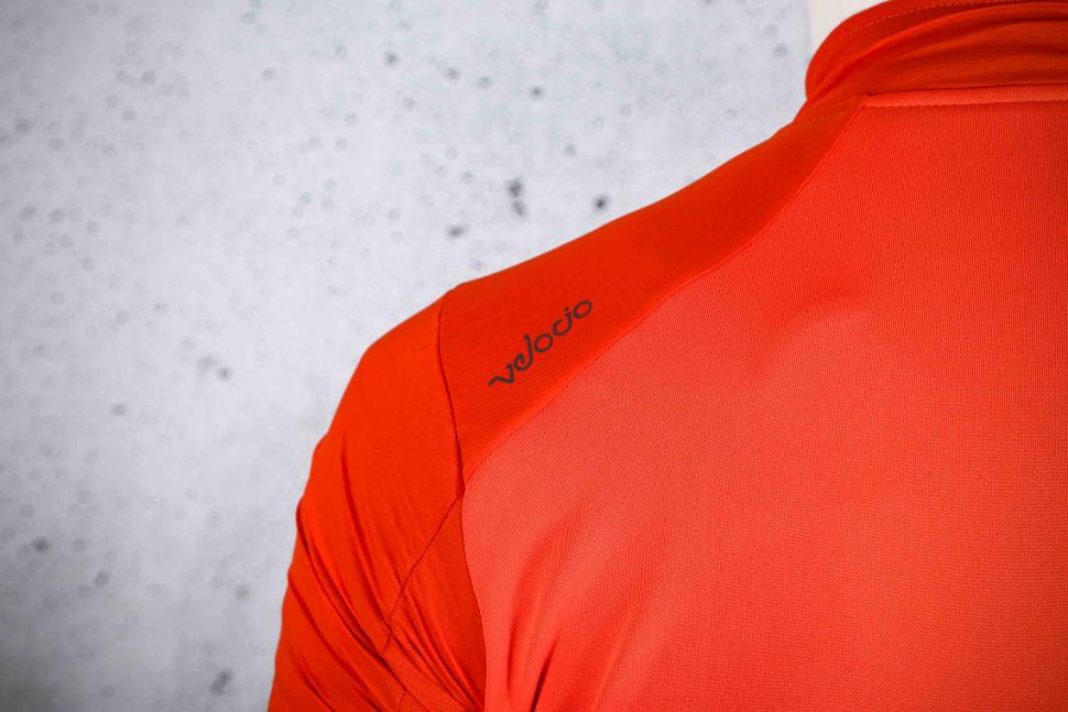 2023 Velocio Alpha Merino Air Jacket - shoulder logo.jpg