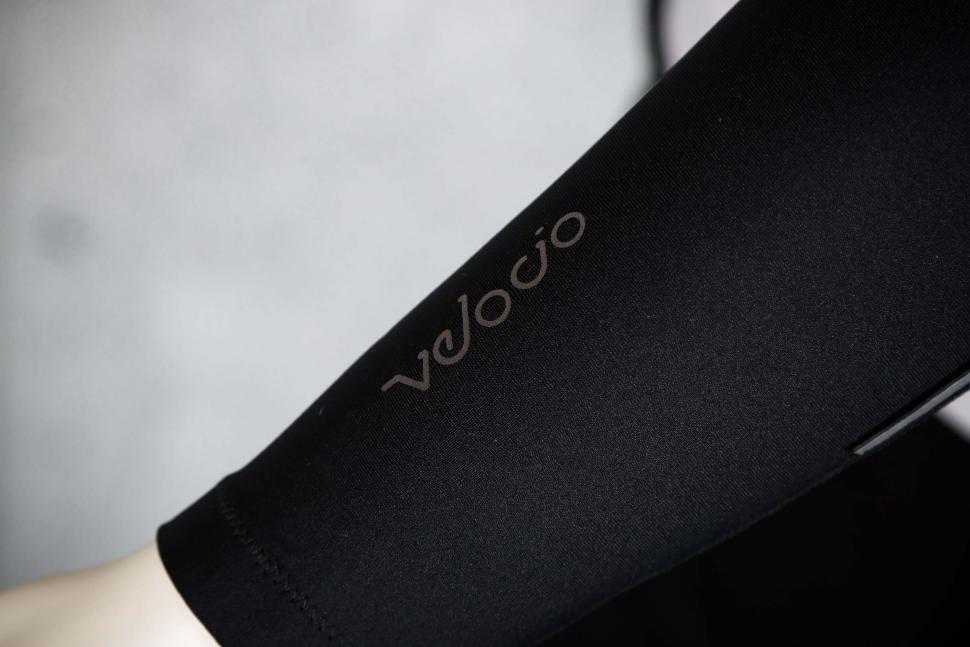 2023 Velocio Arm Warmer - arm logo.jpg