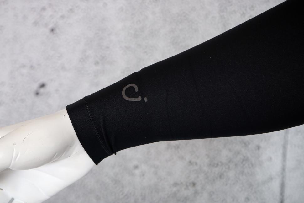 2023 Velocio Arm Warmer - cuff logo.jpg