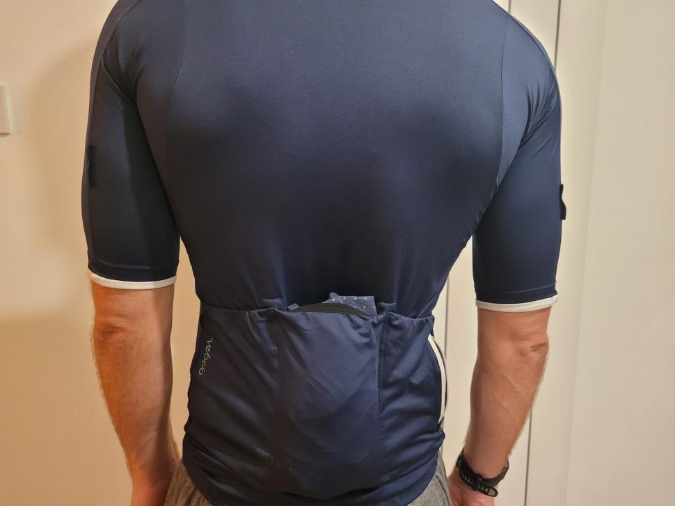 2023 Velocio Ultralight Rain jacket rolled.jpg