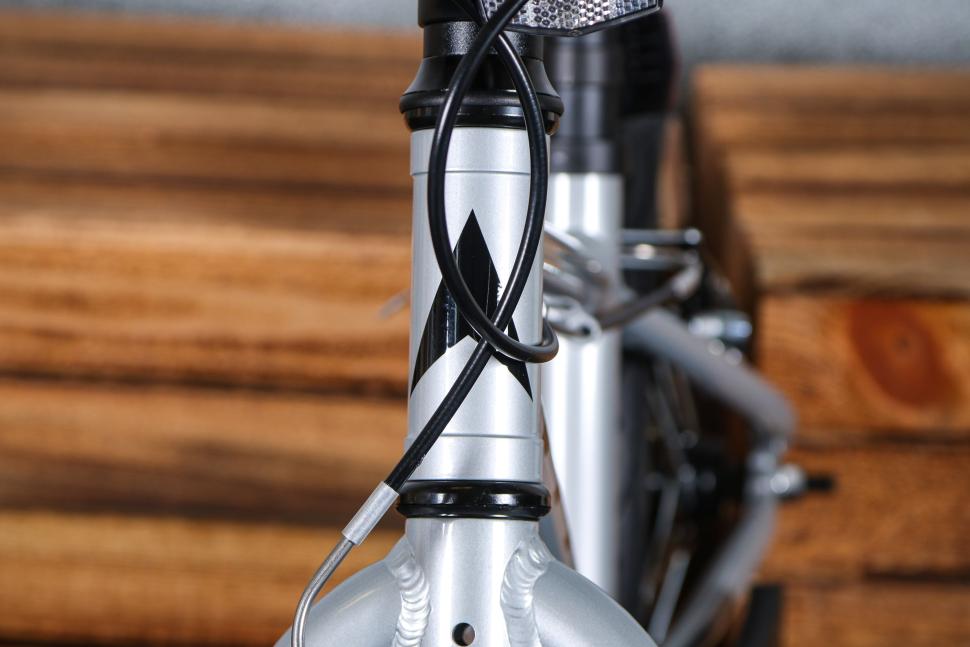 2023 Vitus 14 Kids Bike - head tube badge.jpg