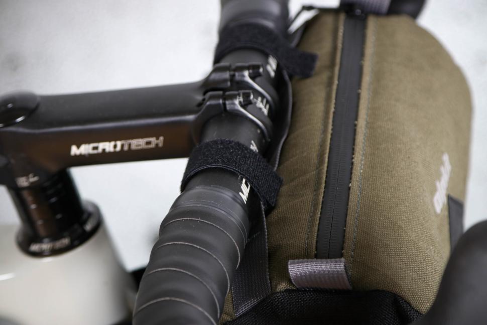 2024 Alpkit Top Loader 4L Canister Handlebar Bag - bar straps.jpg