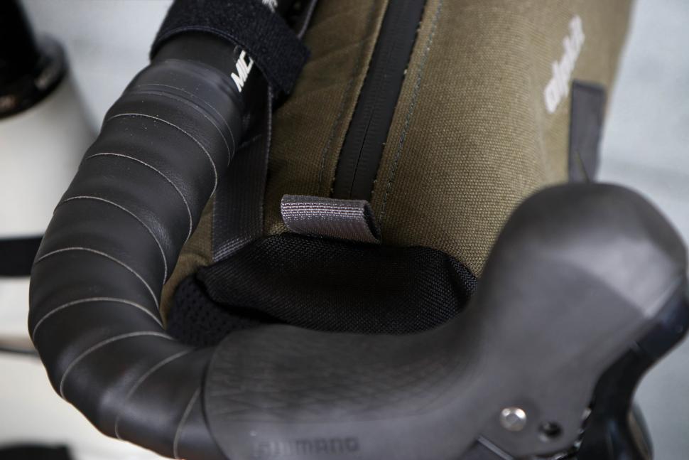 2024 Alpkit Top Loader 4L Canister Handlebar Bag - loop for carry strap.jpg