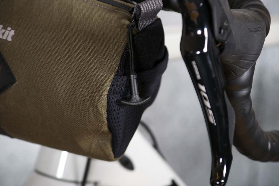 2024 Alpkit Top Loader 4L Canister Handlebar Bag - zip pull.jpg