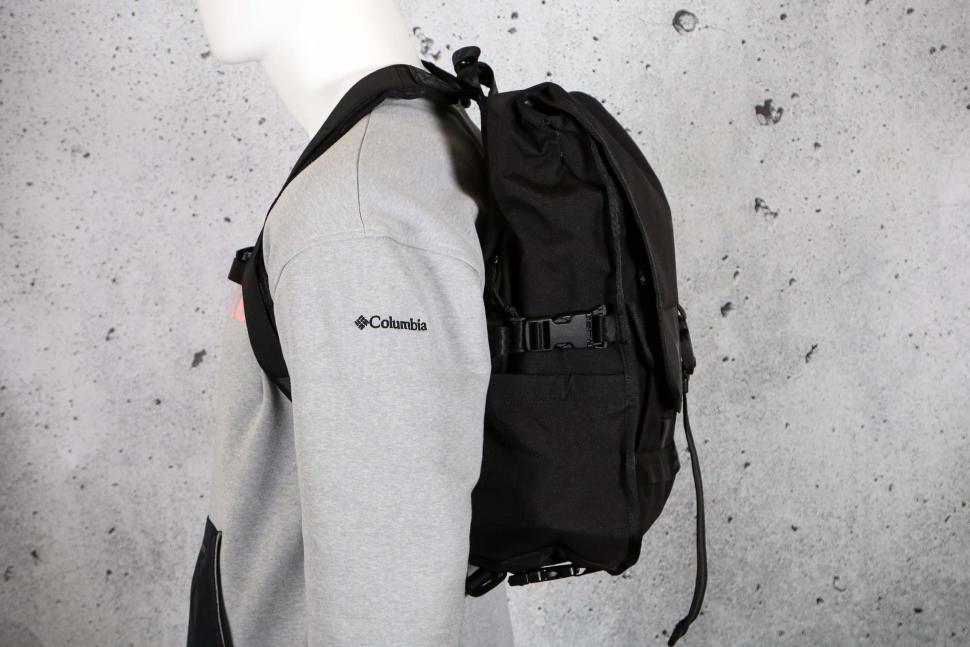 2024 Chrome Warsaw 30L Pack - side worn.jpg