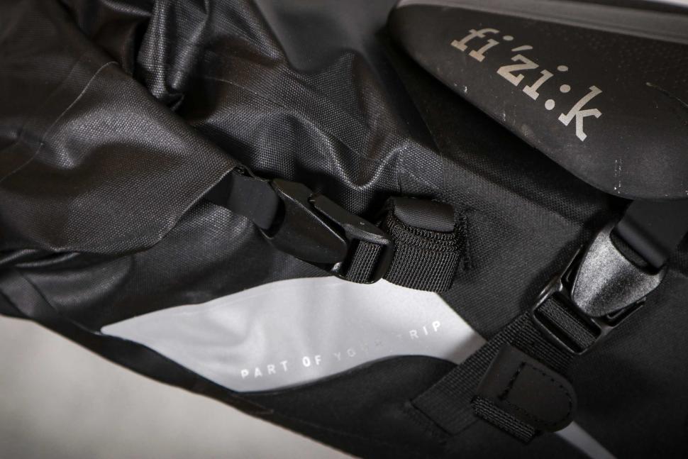 2024 Cube Acid Saddle Bag pack PRO 6 - strap detail.jpg