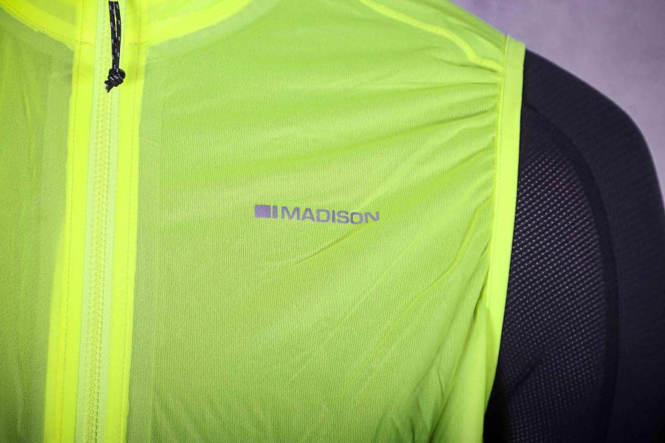 2024 Madison Flux Men's Ultra Packable Waterproof Gilet - logo.jpg