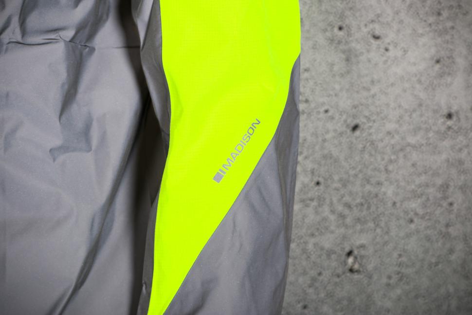 2024 Madison Stellar Ultra Reflective Men's Waterproof Jacket - sleeve logo.jpg