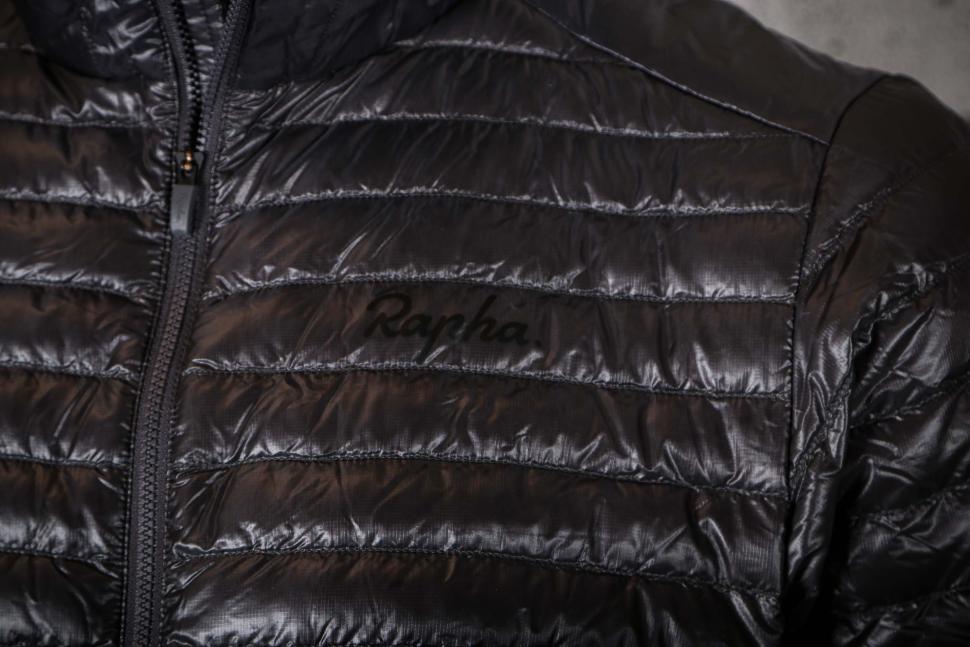 2024 Rapha Mens Explore Hooded Lightweight Down jacket - chest logo.jpg