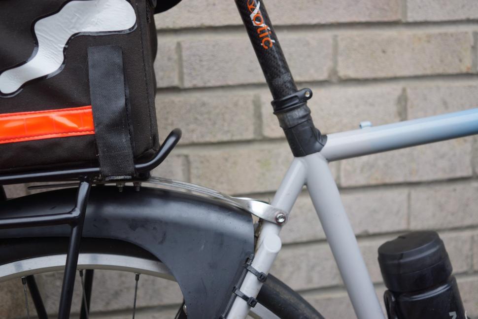 2024 Topeak Uni Super Tourist DX Disc attached to mono stay.JPG