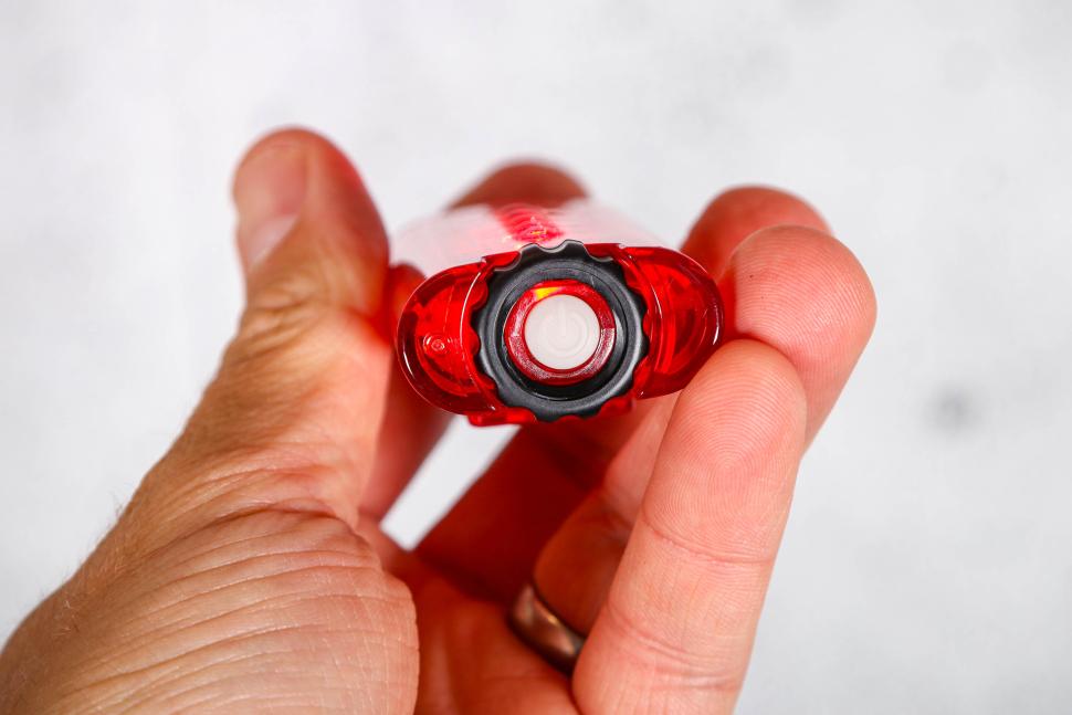 2025 Cateye Tight Kinetic Rear Light - power button.jpg