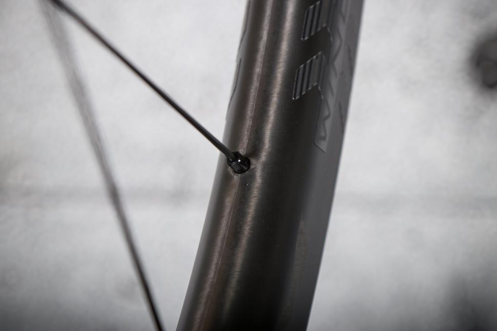 2025 Fulcrum Wind 42 Carbon SRAM XDR TL Disc Brake Road Wheelset - spoke nipple detial.jpg