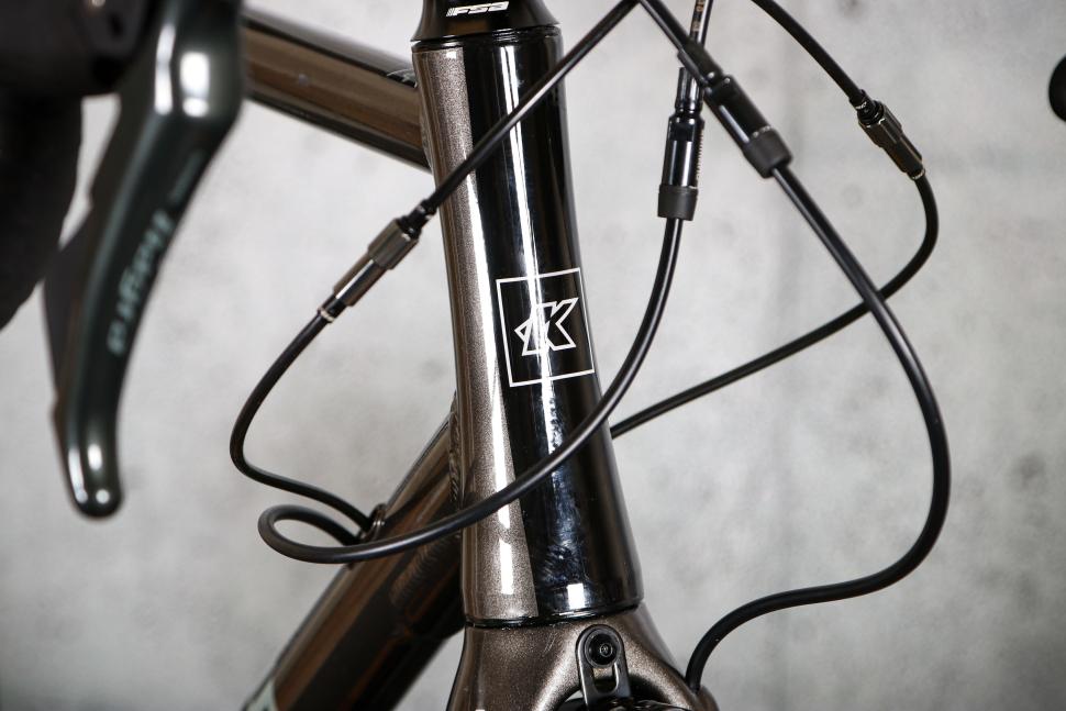 2025 Kinesis 4S Tiagra - head tube badge.jpg