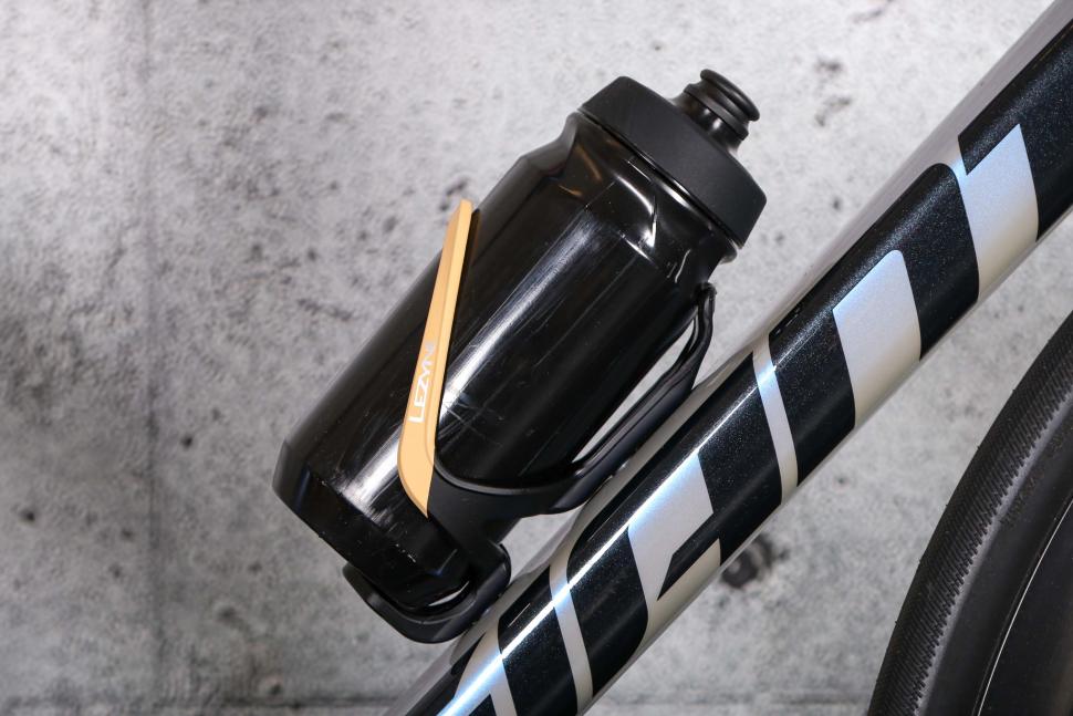 2025 Lezyne Matrix Team Bottle Cage - with bottle.jpg