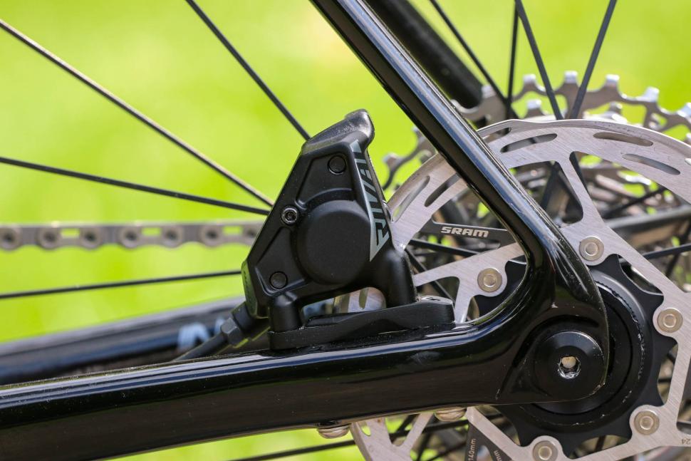 2025 SRAM Rival AXS - on bike - rear disc brake caliper.jpg