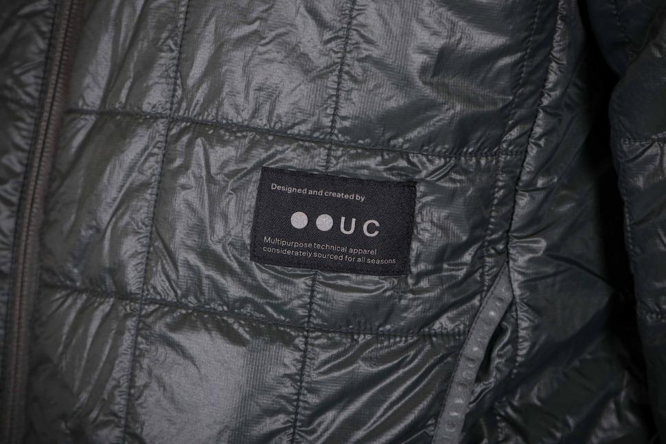 2025 Universal Colours Unisex Insulated Packable Jacket - logo tab.jpg