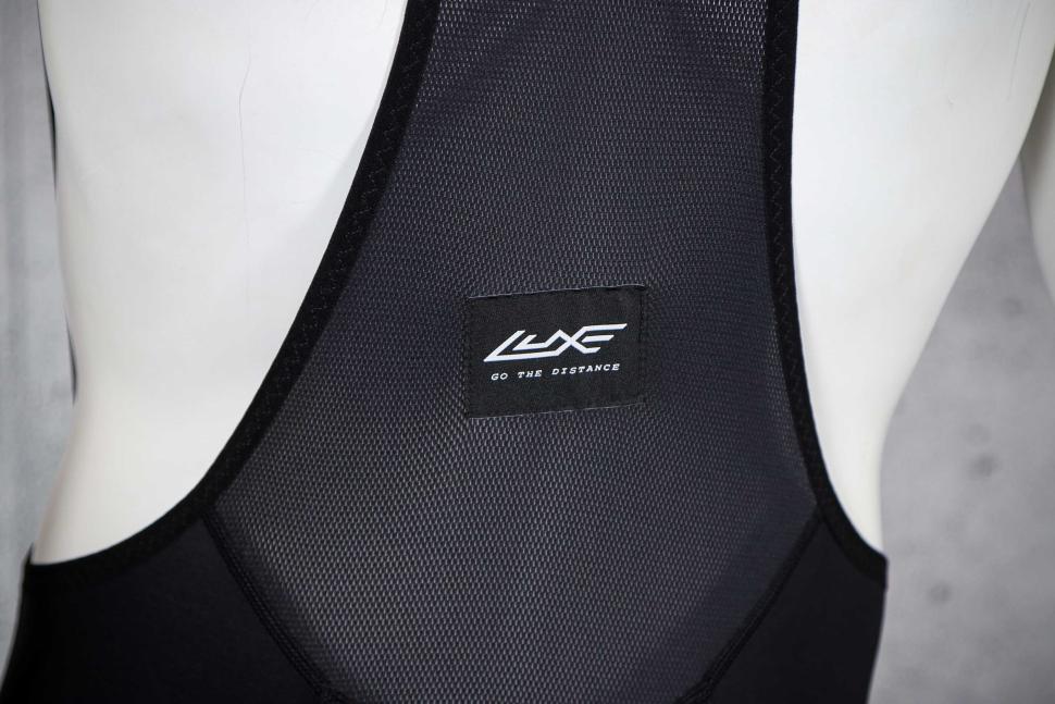 2025 Velocio Men Luxe Thermal Bib Tight - straps back detail.jpg