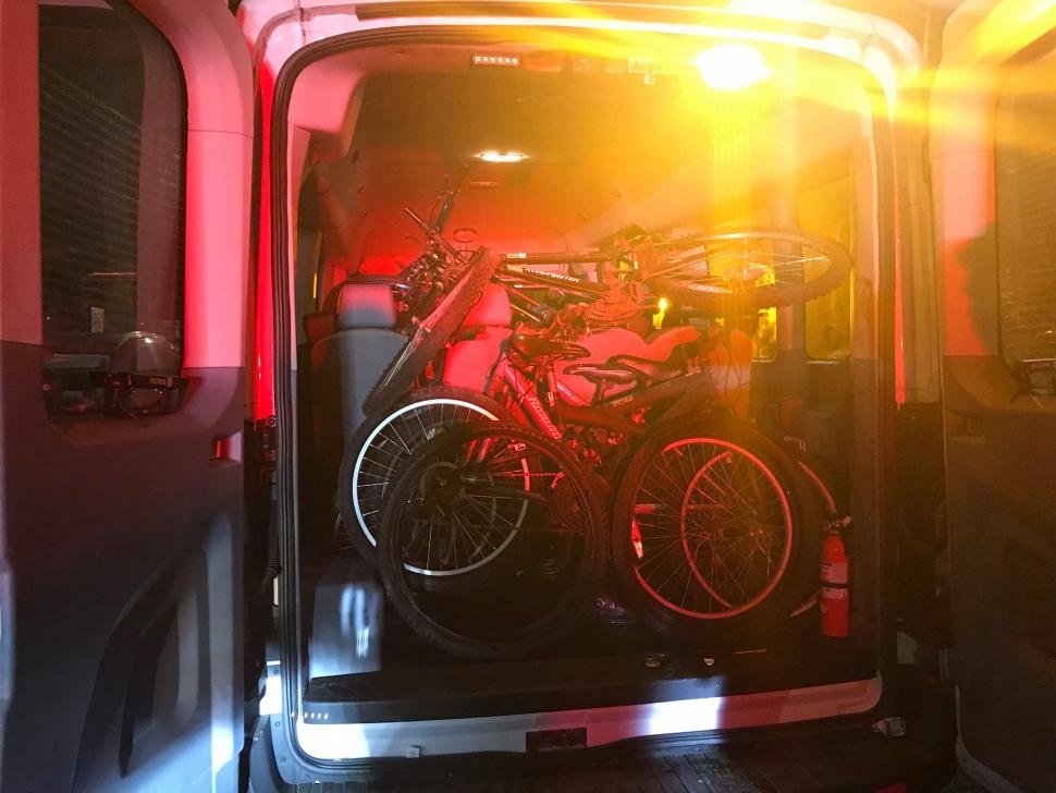NYPD remove chained bicycles (Image: NYPD 107th Precinct/Facebook)