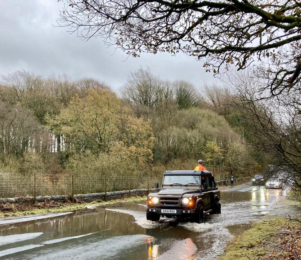 4x4 driver helps club cyclists across flooded section of road (Austin Kirkham, Facebook) 2