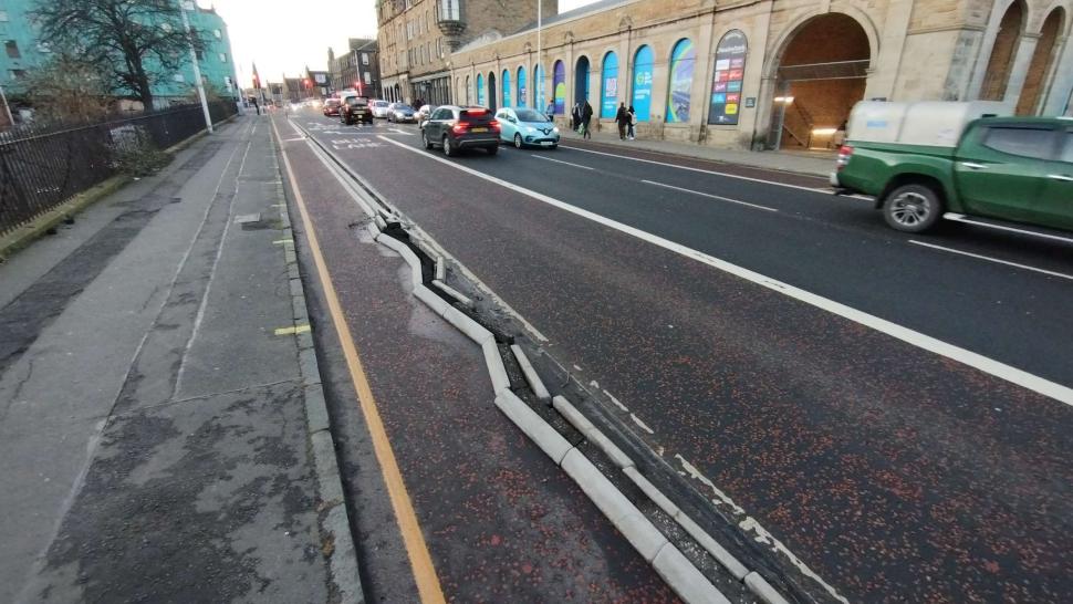 "Paint is not protection, here's why": Damage to Edinburgh cycle lane (FixMyStreet)