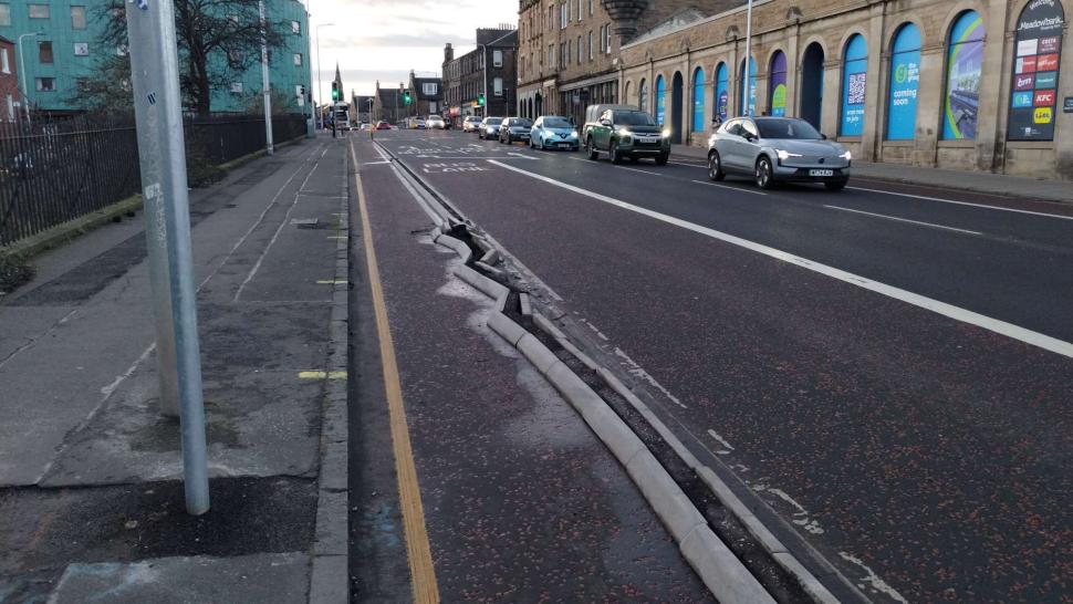 "Paint is not protection, here's why": Damage to Edinburgh cycle lane (FixMyStreet)