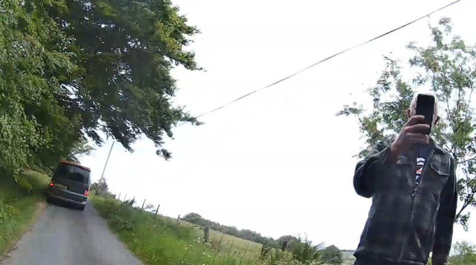 Van driver allegedly shoves cyclist to the ground in road rage confrontation after collision in Carmarthenshire