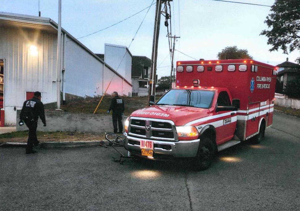 Ambulance driver crashes into cyclist (Rainier Police Department)