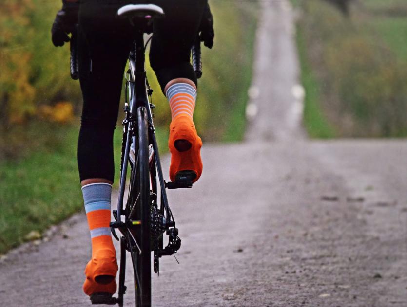 This Is Cambridge Oversocks - Orange Pedalling.png