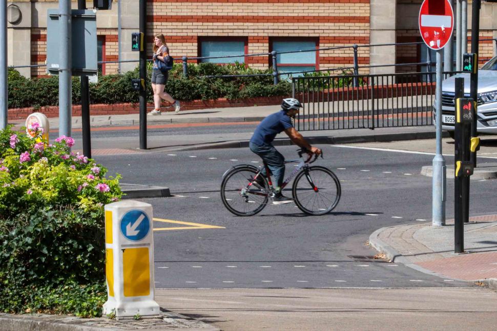 Cyclist crossing road junction.jpg