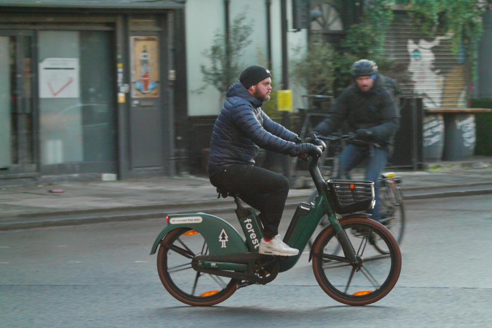 Cyclist in London forest e-bike - copyright Simon MacMichael