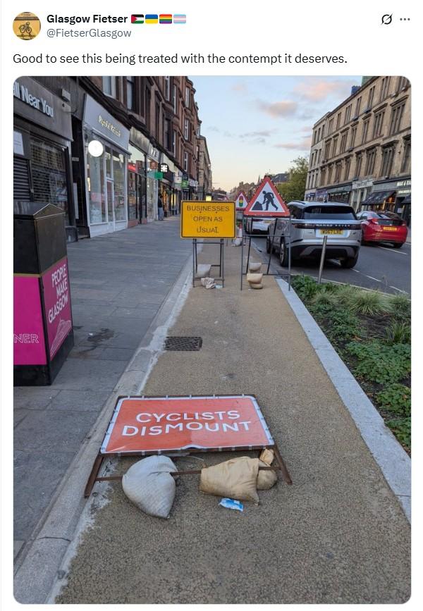 Cyclists Dismount sign knocked down in Glasgow