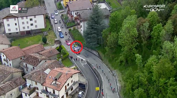 Davide Ballerini squeezes through gap after driver swerves during 2023 Giro d'Italia (GCN)