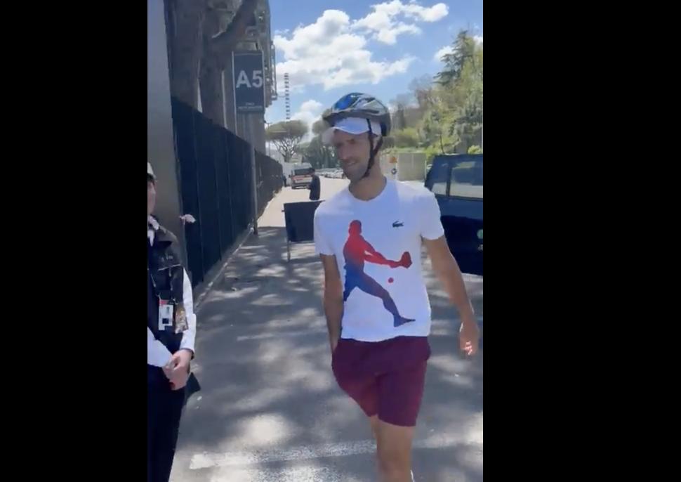 Djokovic wearing a bicycle helmet at Italian Open 2024