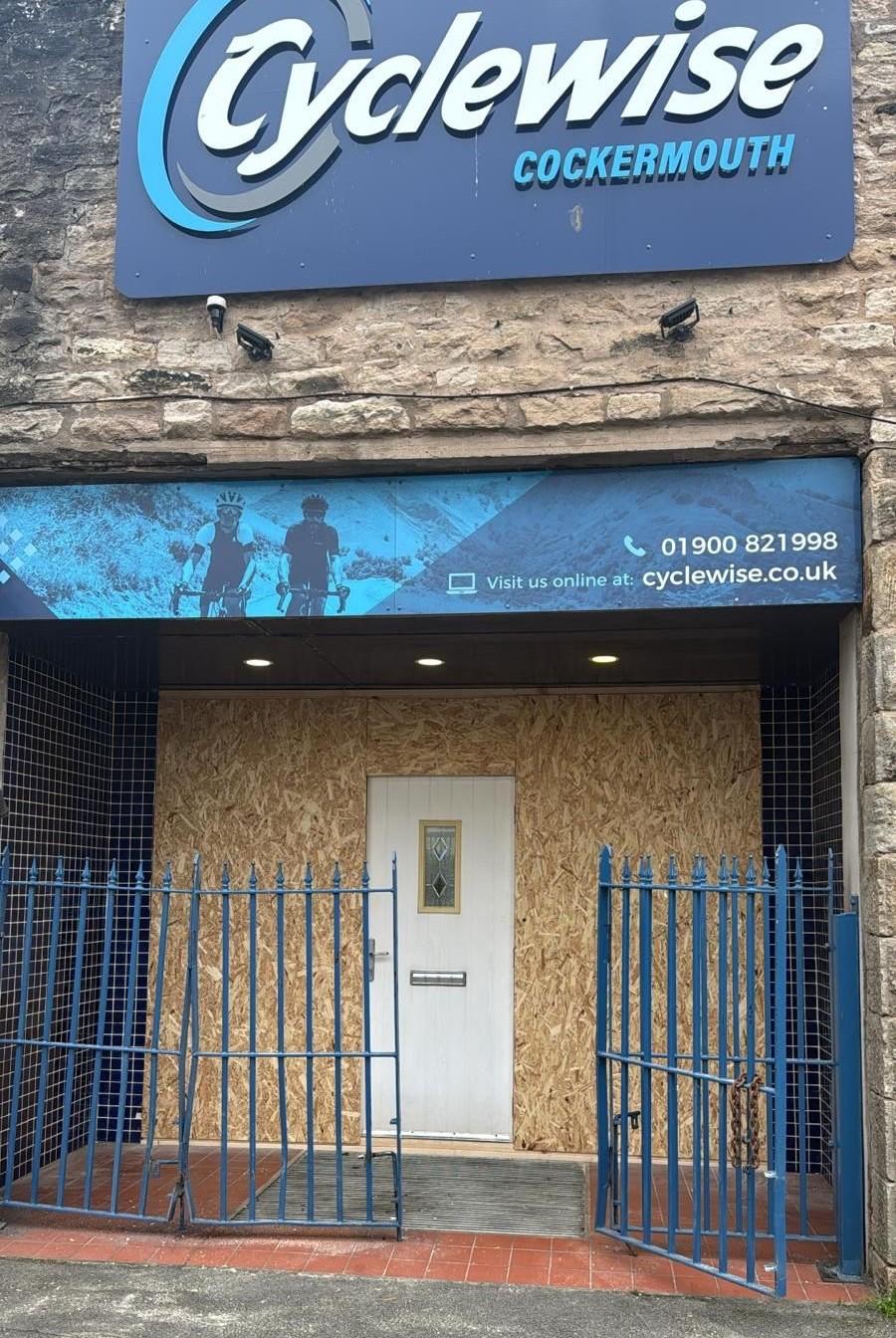 Cyclewise bike shop temporary hoarding, Cockermouth (cropped)