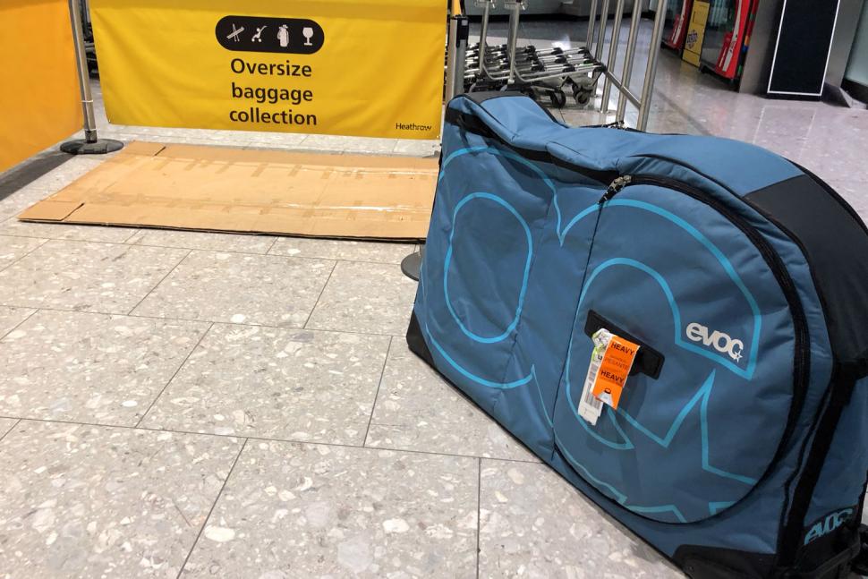 Evoc Bike Travel Bag and stand - airport 2.jpg